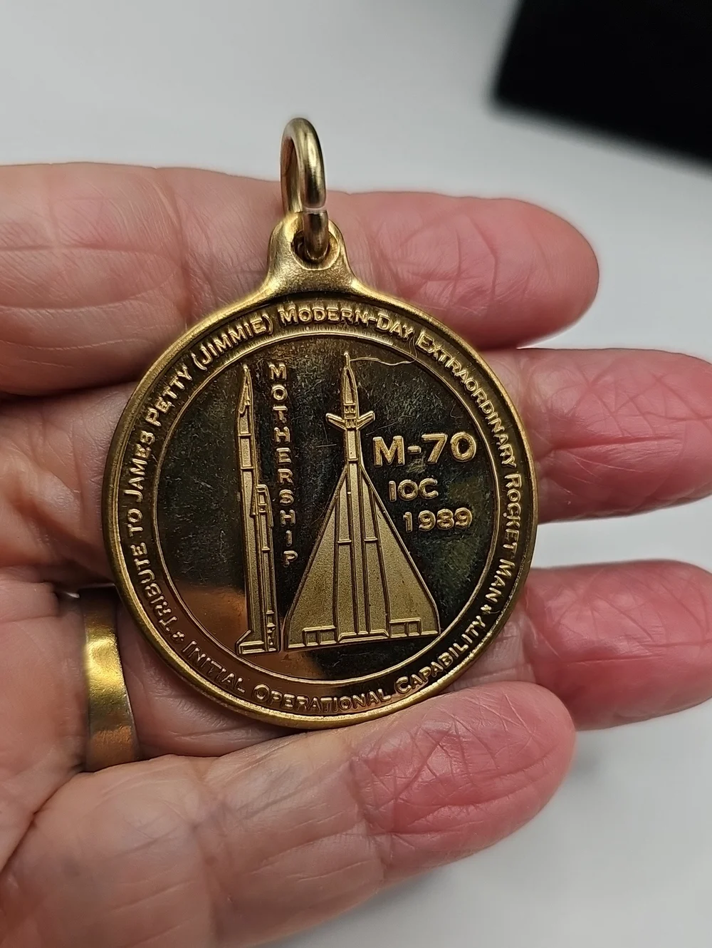 Vintage 1989 James Petty M-70 Mothership Medal Pendant Mens OS Gold Space Rocket